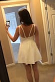 Runs a little large. I usually order medium size dresses but I took a chance on a small after reading other reviews. It is sooooo cute! A little short, but it's for my bachelorette so it works! - Kati S.