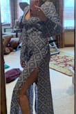 Loved this in the catalog. I'm not a fan of the material. Thin, no give, weird feel. The décolletage gaps and doesn't fit quite right. Once again slits all the way up to the top of the thigh. At least they are on the sides. Unfortunately this will be going back. - Jacqueline R.