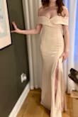 Love the dress. First time buying from Lulus and I am very happy with the result. So the color is less champagne than my photos show or less coral than it shows on the site. It is a nice soft blush pink. I bought XS and I usually wear a 34B bra but with this dress, I won't wear any as it fits very well without one. The fabric is thick enough. Very good quality. I am very happy with my choice :-). - Julie D.