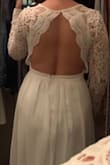 I felt so beautiful in this dress. My husband and I decided to have a small intimate wedding and this dress was perfect for that. The fit was spot on, I only had the length altered and had it pressed so you wouldn't see any wrinkles. Just beautiful and comfortable too! - Maria V.