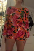 This was so tight I couldn't even walk, I have a long torso and this is a romper that definitely won't work if you have the same problem I do. I couldn't even zip it. And also not appropriate for a wedding - Amanda B.
