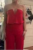 This fit my body very snug and I'd say it was flattering but the top would not stay up . Bought it for a wedding but I'd be miserable wearing this. The second I lifted my arms it would fall town or I'd slip out a little - Amanda B.