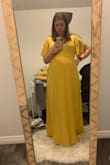 Dress is a perfect shade of mustard yellow for spring! I bought it for a photo shoot and I was 26 weeks pregnant so dress is flattering and forgiving in all the right places and at the same time accentuated my baby bump in a super cute way! I plan on wearing it for many different occasions, casual day with friends, I can dress it up for a night out or party and is breast feeding and post pregnancy friendly I can see myself growing on the belly and still being able to wear it. I wear it with flats so it's a little bit long, not too much but a small heel or wedge would be best for it!! I am currently 28 weeks and dress still looks good and is growing with me! - Ashley H.