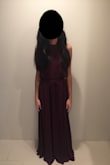 I enjoyed wearing this dress to two of my formal functions in the past few years. However, before the first time I wore it, I needed to get it altered. The dress was too long and I believe I needed to take in the sides a little because of how skinny I am. My hip size is actually 32", but this dress has a free flowing hip area. Other than the alterations I made, the dress is great! If your bust size is smaller, you can easily adjust the neckline with the halter top straps. I this picture I am not wearing heels, but I wore heels that were around 2" high and they it fit nicely. - Devyn C.