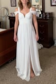 Bought this for my upcoming wedding. It's a beautiful dress. XS was too tight in the chest but the S is good. Bust area could do with larger than A cup breasts but a bra will rectify that. I'll also need to have it hemmed several inches especially as I'll be wearing flats. - Erica B.