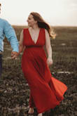 I order a medium and it was a smidge big in the waist and a little too long for my body in the straps. This happens in most dresses for me so nothing to worry about. I did have to cut some off the bottom because I'm shorter. But it was everything I could ask for in a dress for engagement photos. - Shianne H.