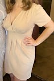 Wore this to my friends Bridal shower and it was perfect! Very flattering and comfortable. I did have to play around with some fashion tape so you didn't see the edges of my bra but that was it. It does look more pink in person than in certain photos. - Caitlin F.