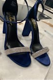These shoes were the perfect shade of blue I was looking for for my wedding. I was specifically looking for a block heel and the satin fabric fits the occasion perfectly. It also fit my budget. I added a little DIY bling to give it that perfect glam. It came out perfect. I used E6000 glue and bridal rhinestone trim for the perfect touch. - Silvia M.