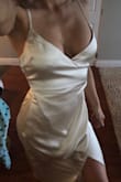 This dress fits so well, and is a beautiful champagne colour. The faux wrap detail on the side gives my curve a little oomph! - Katelyn C.