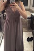 It's beautiful, but a little short on me. The color is flattering, but not the shade in the original photo. - Mollie A.