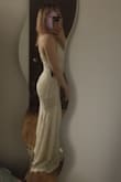 This dress is beautiful! At first I was concerned because the liner is tan/beige not white like it appears in some of the photos online. However, the overall look of the dress is still white and the lace is gorgeous. Currently my #1 pick for my wedding dress! Never imagined I would find a wedding dress this beautiful at such a great price point. - Tessa B.