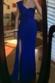 The dress fits great! It was a little loose on the top, but I don't think I need to get it altered. It fits my shape perfectly and I love the slit! The color is just as depicted. Can't wait to wear this to my senior prom! - Karly L.