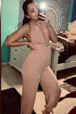 I was so so excited for this outfit! I received it, tried it on and already ordered it in the olive color. I love the fit and I love how the tie wraps down the shoulders, across the back and around the waist for a very elegant look. It covers the breast area comfortably and I would definitely say it can be dressed up or down. This is an all around great outfit, it's a little heavy in material but with the top portion being so open it evens out for a great outfit on a warm day. - Katarina