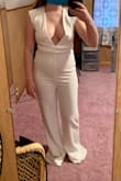 Absolutely loved this jumpsuit and wanted to wear it for my rehearsal dinner. The fabric is super comfortable, stretchy and high quality. It fit perfectly except that the bust was really loose - absolutely no way I could have worn this in public. I would have hemmed the pants if they fit better. Disappointed I had to return - Jenna C.