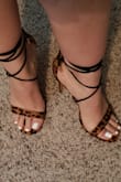 Not only are these heels true to size, but some of the most comfortable heels owned. The straps stay laced up, whether worn high or low (as shown). These a super versatile, dress up or down. Super happy with my purchase! - Cindy A.