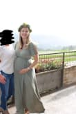 I own this dress in both yellow and sage green. I purchased the sage green to wear for for my baby shower. I love that the dress works so well for being pregnant or not. I didn't have to waste money on a maternity dress and now have something I can wear anytime. One issue is be very careful when washing - DO NOT DRY. I even put it in the dryer to get some wrinkles out and it shrunk up. - Andrea F.