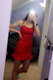 This dress was a lot longer than expects as it went further than the tips of my fingers. It was tight in most places but not all. Not too many complaints but definitely not for me! (I had it rolled up in the photo) - Meg H.