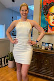 Fit well but not my preferred neck line so returning. The back I loved! - Gabriella B.