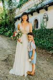I knew from the moment I saw this dress online that I wanted it for my wedding. It was the first and only wedding dress I ever tried on. It was beautiful and wonderful in every way. I am 5 ft 5 and wore about 1.5 inch heals- for ZERO alterations! The straps were a little loose but I didn't mind for the price! - Lisa R.