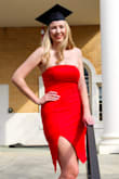 I am obsessed with this dress! It is made of a super comfy stretchy fabric I love the slit. I wore it to take my graduation pictures and it was perfect! - Caroline H.