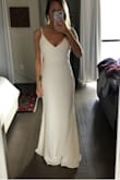 Bought for our upcoming small ceremony wedding. Exactly what I wanted and fits awesome! I'm bare foot in this photo and 5'7 so could get away with an inch or two for shoes but otherwise fits great. The white is not see-thru either!! May take it in an inch or two around the waist but I have smaller hips and waist. Looks way more expensive than what I paid! Can't wait to wear in July! - Brianne B.