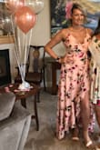 It fits nicely, I'm quite tall and busty, but sorta thin (size 6), so I ordered a LARGE.
The length was good, even with heels. I got compliments ALL day on it! Fits perfectly around my chest, a bit loose elsewhere but I loved it. - Caitlin T.