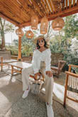 This top definitely fits a little oversized but you can make it work! Tuck it in or wear with some cute biker shorts! Love this look <3 - Evelynn J.