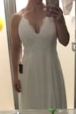 Beautiful , flowing dress with delicate lace on top. Will be using for my beach wedding! - Christine B.