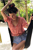 A lot of crop tops with elastic waist can look too puffy but this is perfect! - Amber L.