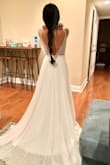 I can't wait to walk down the isle to my forever guy on this dress. This dress was a little longer but I think I'm just going to tailor the front and leave a little train in the back. I also need to take in a little bit of the straps. I'm in love with this dress. The material is high quality! I will give an update on my final look!! - Liliana