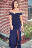 Dress fit perfectly and was so comfortable. I literally danced all night long. There is a little stretch in the material so it hugged my body without making me feel constricted. I got so many compliments all night. If you are on the fence, BUY IT! - Shelby L.