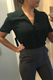 I think this style looks better on the model/ someone for flat chested. It's a nice basic work top. Love the color. - Rebecca R.