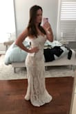 This dress is lightweight and soft/sexy. For my tiny wedding it was just what i needed, more of a boho style. I ordered a small originally which was perfect except for my boobs were too big...annoying. The medium reorder did the trick! I love it. - Leann H.
