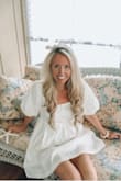 This dress is absolutely adorable and comfortable! It fits true to size and is shown in an XS. It is even cuter in person and I love it!! - Elizabeth Y.