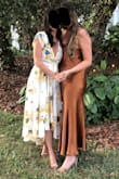This dress was very flattering and fit true to size. It was a bit long and I stepped on it a couple of times, especially when sitting, but for taller girls this dress will be perfect. I wore it to a wedding and loved it. - Danielle G.