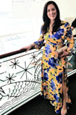 I wore this to a matinee of Hamilton in Miami. I got so many compliments on the dress and it was so fun to wear. It fit perfectly and was very comfortable. The length was not too long. I did not have to get it hemmed. I ordered a medium. Since it has a zipper and no stretch, a small would've been too tight. - Adriana D.