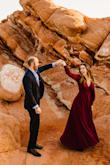 I wore this for engagement photos and the wrap style is so flattering on all body types. I am large busted and the medium fit my bosom better and the wrap part allowed me to fit to my waist perfectly. I'm usually in between small and medium in lulus, I sized up to show less chest. Many compliments received! Showstopper gown for sure! - Katherine B.
