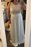 I wanted a simple, elegant dress for our civil ceremony in September. This dress fits perfectly and allows me to feel bridal, but not overly fancy. I can't wait to wear this on our special day! - Ashley H.