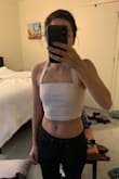 I loved the material and color of this top and it fit great too for a smaller chest with the back being scrunch material to let it stretch to fit any size however it was too short for me. I planned to wear high-waisted pants with it but it came way above my belly button. Note: In the picture I'm not wearing high-waisted pants. - Sonja S.