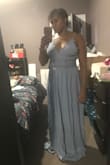 The color is a big darker than in photos. And definitely not made for shorter gals since it drags on the floor. Also not for larger chested women. Like it better on the model. - Andrea G.