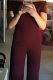 I bought this jumpsuit in a medium (my normal size) and it fit my legs and upper body, but I have a longer torso and it bunched up around the hips every time I walked. I returned it and ordered it in a large because I loved the look of it, and it fit much better in that regard, but I had to get the leg length tailored and the back of the torso area tightened. Even though I had to go through a few extra hoops, I absolutely love it and plan on wearing it to lots of dinner parties! - Molly A.