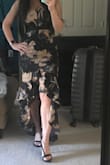This dress fits true to size and softly hugs curves giving a great hourglass shape. You could wear with a bra or petals but either way is flattering. If you're on the fence I say go for it. I doubt you will be disappointed :) - Heidi I.