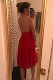 This dress is sooo comfortable. It could be used for a semi-casual day or dressed up with heels and jewelry to be more formal. I'm planning to use it for my graduation photos. The length is just below the knee (as shown), and the back lace detail makes it easy to adjust to your body. I'm very happy with it! (Sorry- these aren't the best pictures.) - Lillie P.
