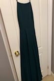 Arrived in 9 business days, delivered to Canada. Will have to alter the bust area to make it a little tighter, but other than that it fit great. Definitely needs a good steam after taken out of the bag. - Emily D.