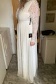 Was hesitant to order offline because I'm tall and was worried that the length overall wouldn't be right, but as you can see it was perfect. I would say that I probably maxed out the XL size though, anyone larger than me wouldn't work in it. I normally wear a size L in women's clothes. - Ali B.