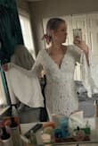 I'm so in love with this boho style dress, and the price is incredible! The dress material feels very quality, has a little weight to it. I was in between getting a small and a medium, went with the medium and it's definitely not as snug in some places as I would like it to be, but I will just get it altered instead of trying to size down. - Laura E.