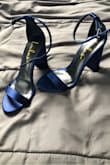 Love these shoes! They were the exact color and quality of the pictures online. The material is satin and looks great, exactly as I was hoping. Would definitely recommend to anyone! - Kendra S.