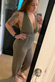 I was nervous to buy this because I don't usually wear outfits like this. I was also afraid that the girls would go running wild with any movement. However, the coverage is impressive. I have pretty big boobs (32F.. not an option on here) and the medium provides full coverage! You have to tie the straps on yourself and in the criss-cross design, which is nice because you can make it as tight or loose as you want. I feel like it fit right in all the places it was supposed to and it is super slimming! Definitely a fun summer look. I'd wear it to a wedding as well. 
About me: I wear a size 6 in pants. I lift a lot so I have pretty big thighs and a butt. I wear a 34DD or 32F depending on the bra. I'm 5'7". Oh! Also.. I either don't wear a bra with it or I wear those rabbit ear sticky boobs! - Abby O.