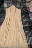 DRESS WAS NOT TRIED ON. Bought this dress for my bridesmaids and didn't even have them try it on due to it being the wrong color. Was hoping for a pale pink BLUSH color and it was very nude. Sorry I can't be any help for fit! - Myranda C.
