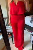 The seam up the center of the torso really helps to flatter the waist line. It does run really long but that is a good thing! A simple tailoring for a perfect fit with the perfect shoes. Can't go wrong. Great support up top but will wear nip covers. Can't wait to wear this! - Lauren B.